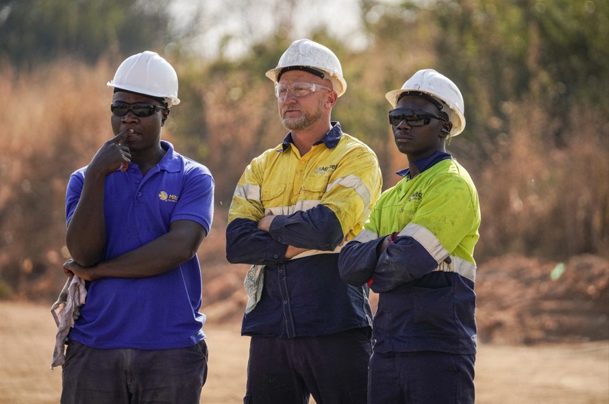 MDI crew celebrating 2,875m depth record