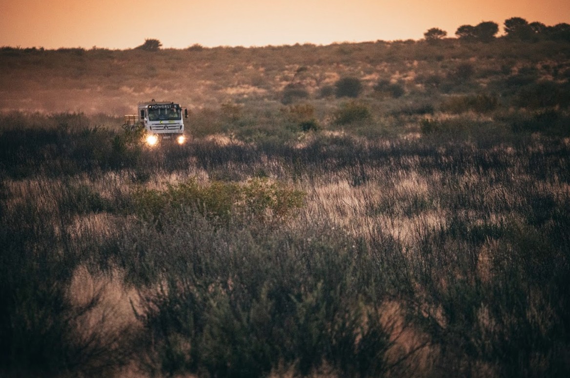 Truck traversing the bush at dusk