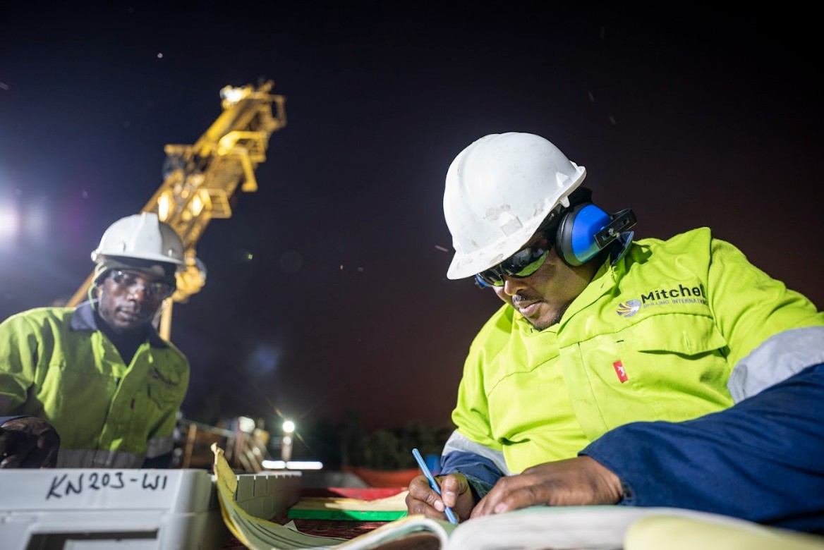 Crew logging samples at night