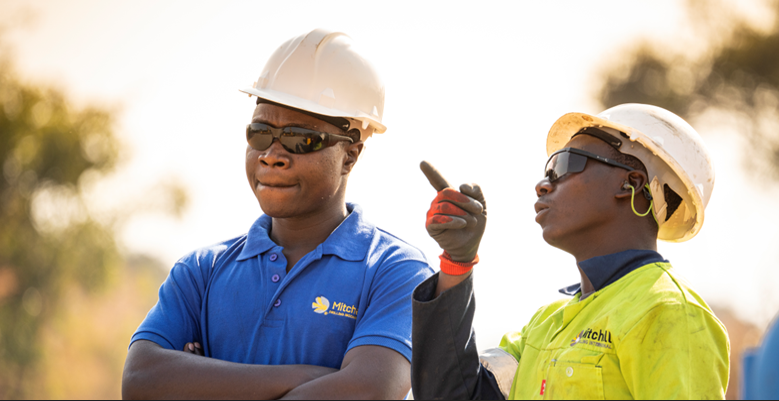 Mitchell Drilling employees in discussion